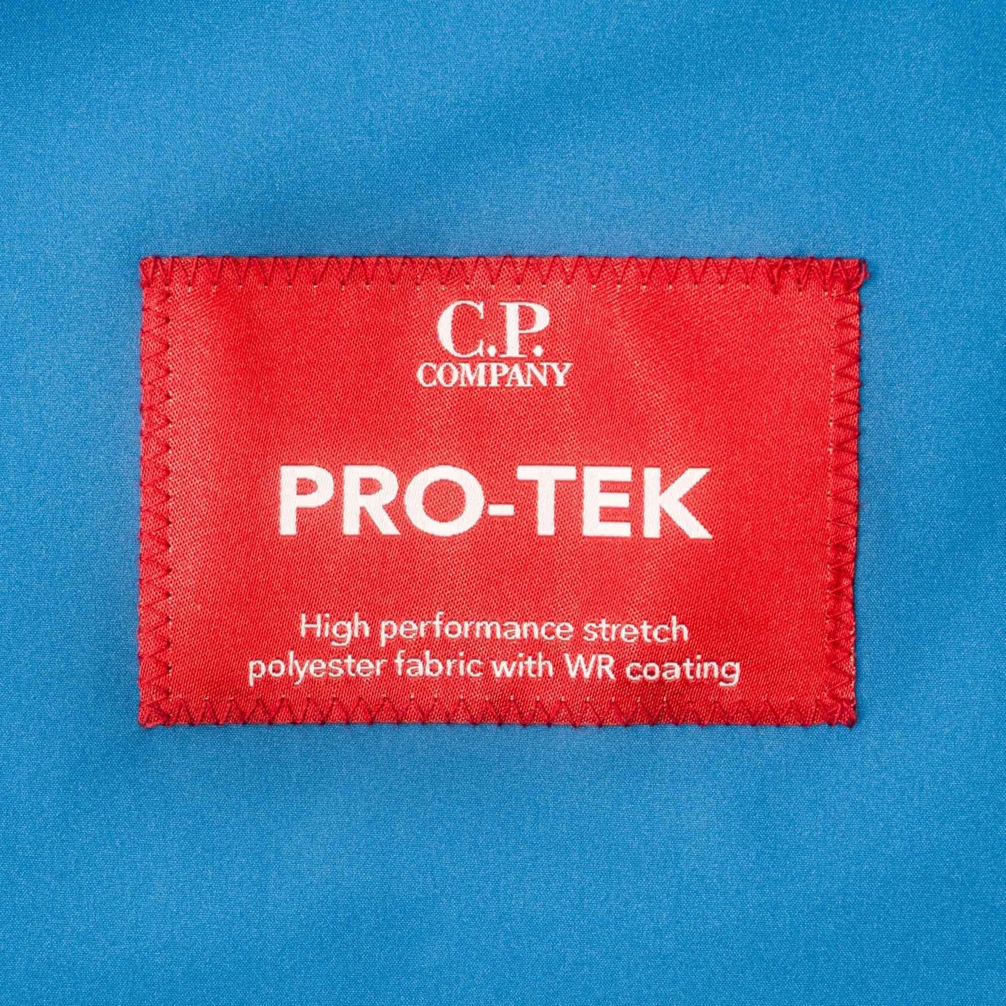 C.P. Company Pro-Tek Lens Hooded Jacket in Ink Blue