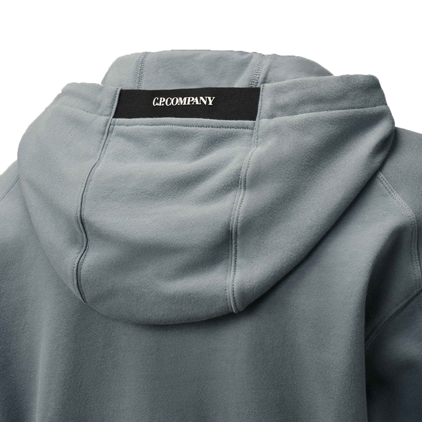 C.P. Company Diagonal Raised Fleece Lens Hooded Sweatshirt in Stormy Weather- Blue